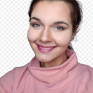 Chloe Crull is seen smiling with a pink turtleneck.